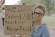 事业是指特斯拉在得州奥斯汀遭遇抗议活动：反对马斯克Robotaxi计划